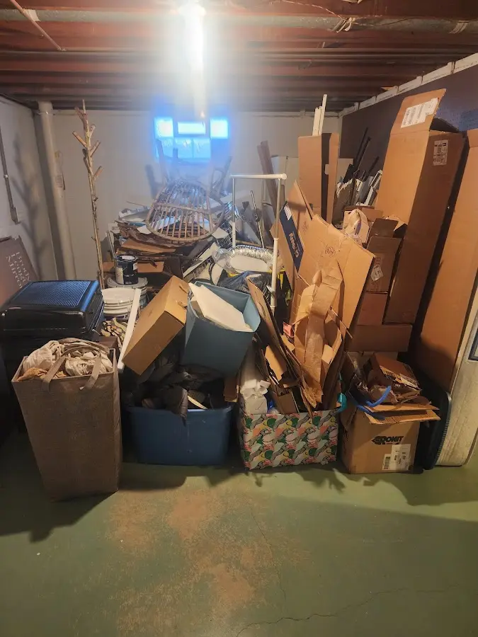 Roll-off dumpster container at job site for Construction Dumpster Rental in North Hampton